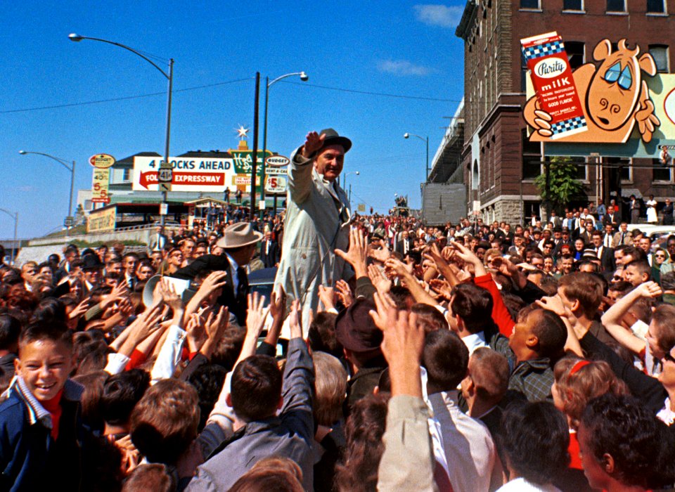 Lyndon B. Johnson waving to crowd (cropped)