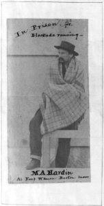 M.A. Hardin, full lgth., seated, facing left, in prison at Fort Warren, Boston, Mass. LCCN2006690281