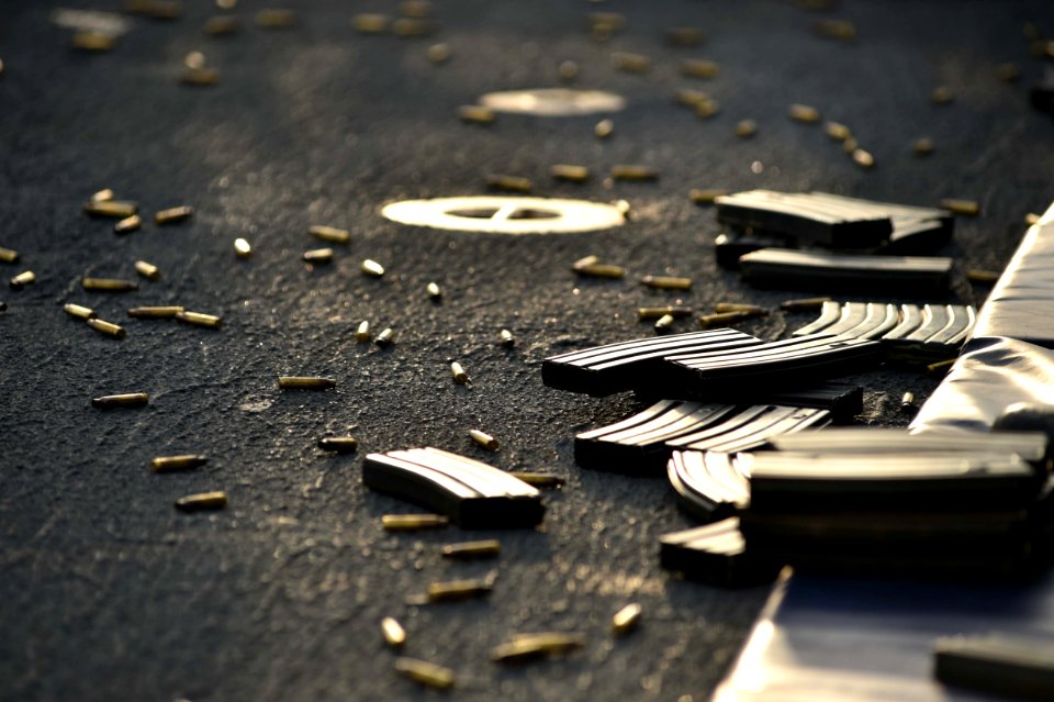 M16 magazines and casings on deck of USS Ross (DDG-71) during small arms qualification 160210-N-XT273-670