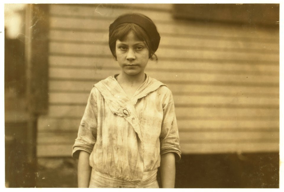 Madeline Causey ten year old worker in Merrimack Mills. Been working there for four months. Fills batteries. Her mother said she was born July 7, 1903. See Hine report. LOC cph.3b21317