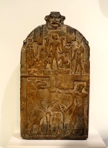 Magical stele with images of Bes, Horus the Child, and Taweret, Egyptian, Late Period, Dynasty 26-31, 664-332 BC, limestone - Sackler Museum - Harvard University - DDSC01856 photo
