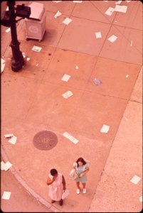 Magazines-and-newspapers-litter-the-intersection-of-sixth--broadway-after-debris-was-spilled-from-a-passing-truck-september-1972 7651226622 o