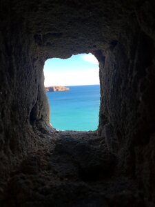 Sea cave sun