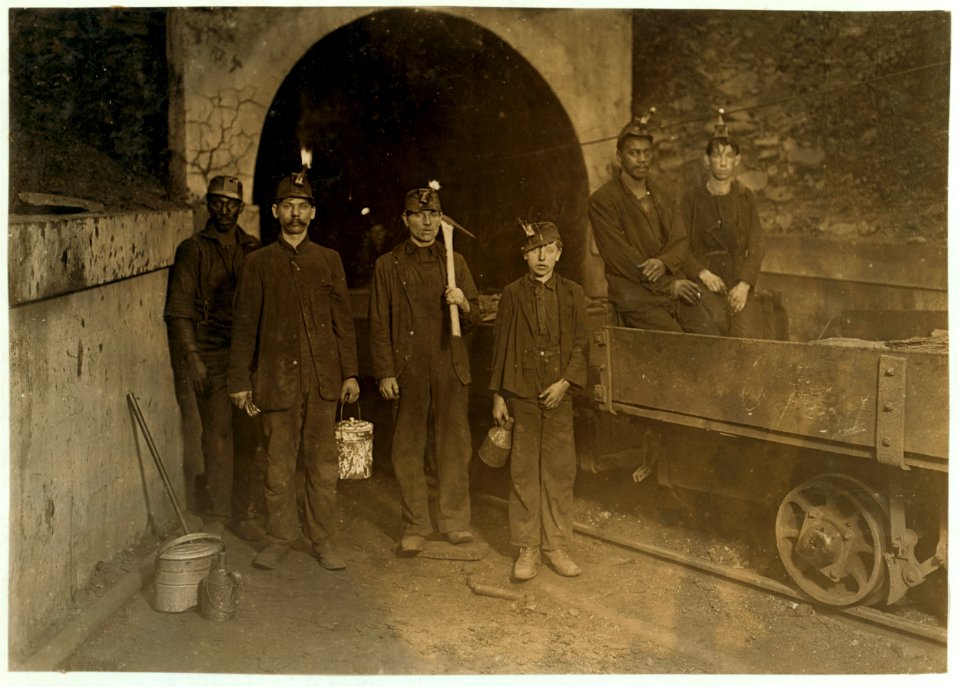 Main entrance, Gary W. Va. Mine. Trapper boy in center. Going to work 7 A.M. will be underground until 5-30 P.M. Trappers are paid $1. per day. LOC cph.3a24699