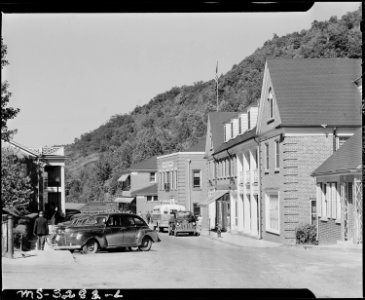 Main street of Wheelwright, Kentucky, Inland Steel Company, Wheelwright ^1 & 2 Mines, Wheelwright, Floyd County... - NARA - 541497