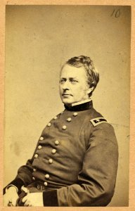 Maj.-Gen. Joseph Hooker, half-length portrait, seated, facing left, arms resting on lap, wearing military uniform LCCN2008680201
