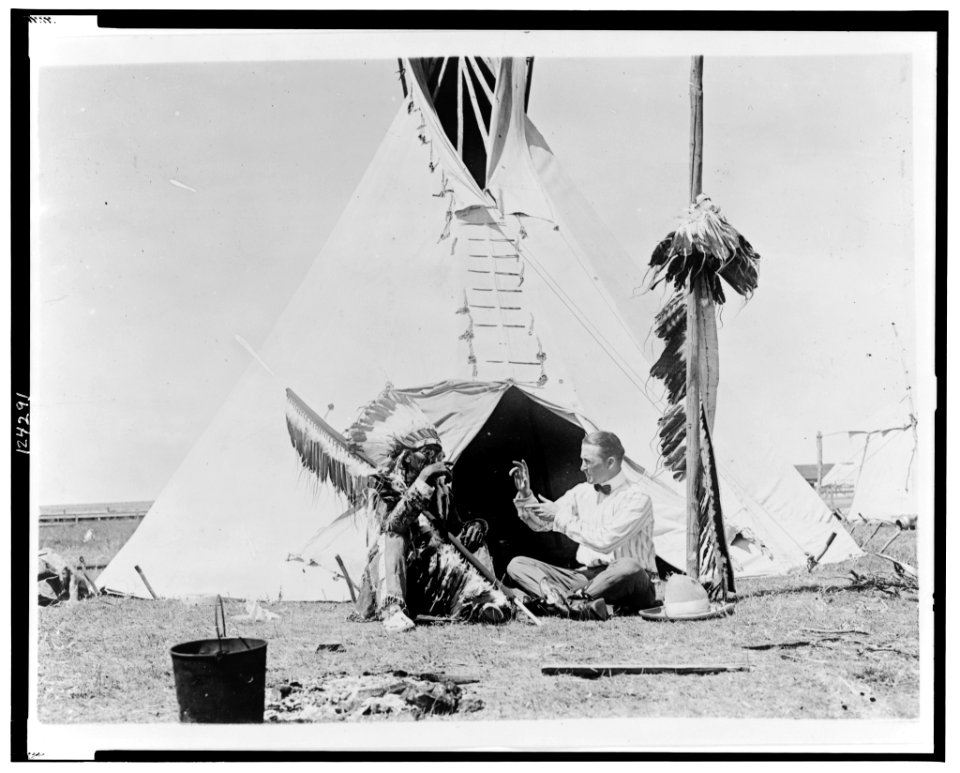 Major F.J. McCoy communicating with Arapahoe chief Goes-In-Lodge thru the sign language LCCN99471586
