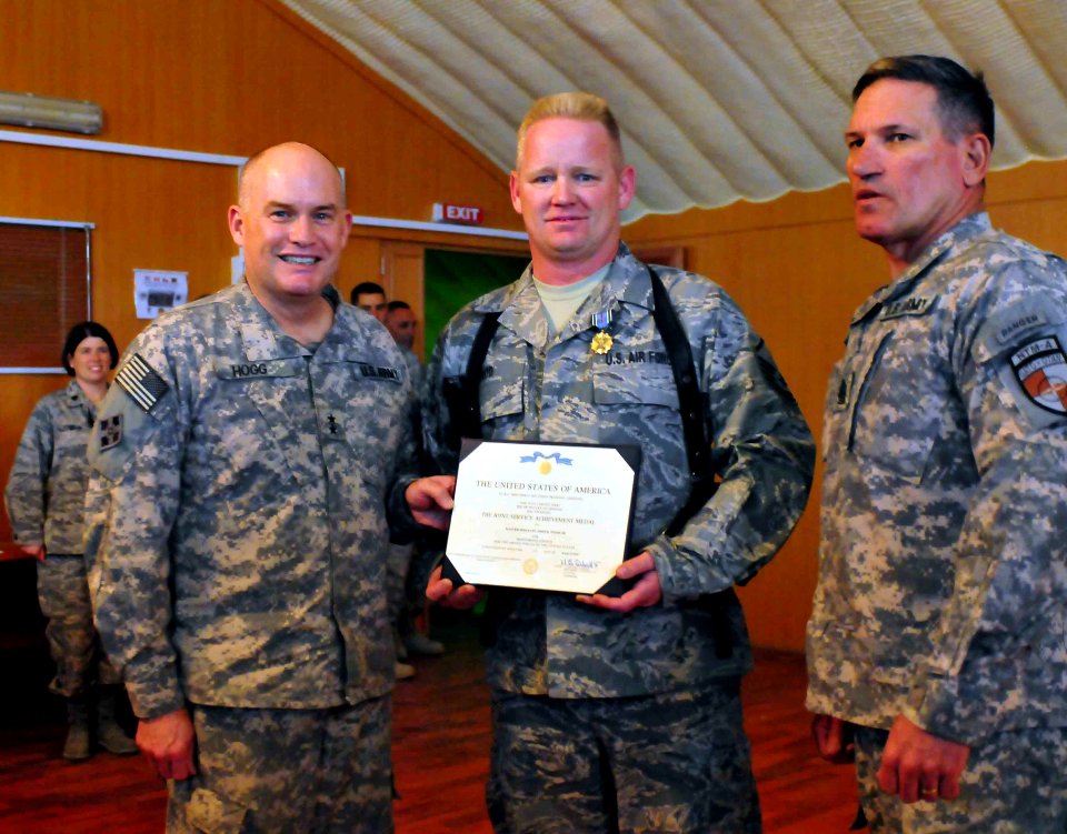 Maj. Gen. David Hogg presents a Joint Service Achievement medal to Master Sergeant John Wood (4525596852)