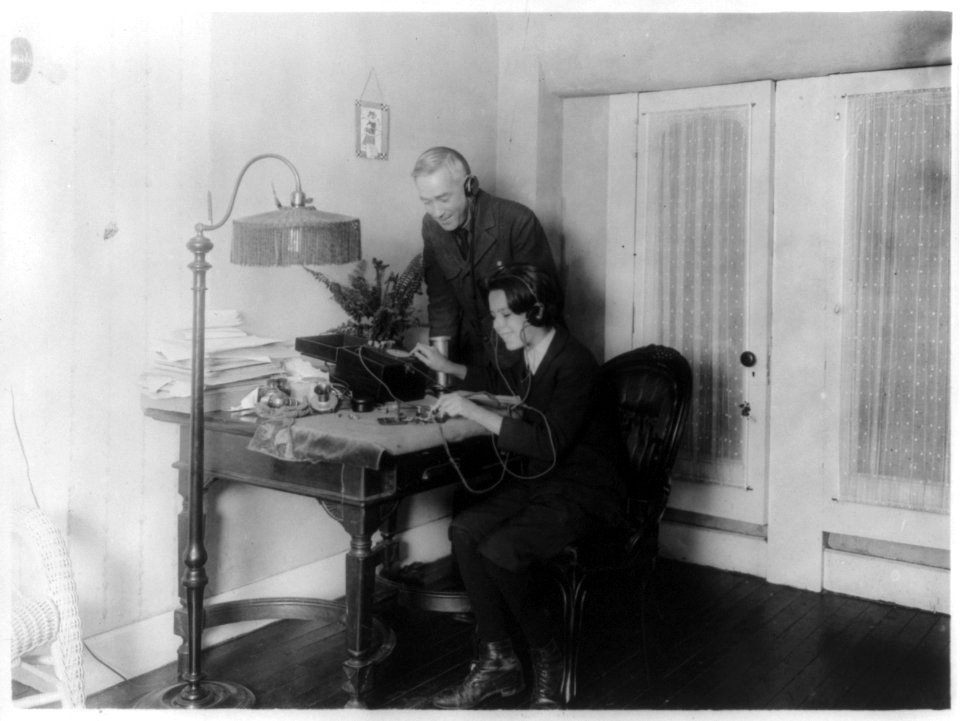 Man & boy with radio LCCN2001706126