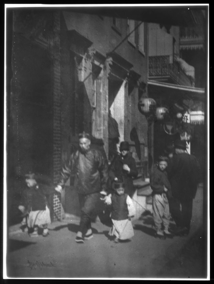 Man and two boys walking along a street, Chinatown, San Francisco LOC agc.7a55078