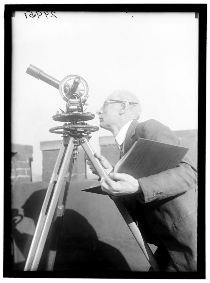 MAN AT TELESCOPE LOC hec.11660