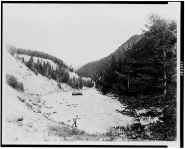 Man fishing in the Fishin' Hole in the Yellowstone River, Yellowstone National Park, reached by the Northern Pacific Railway via Gardiner Gateway LCCN90715864