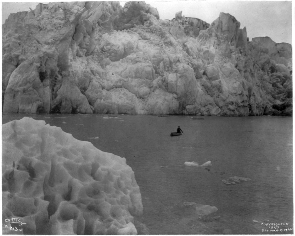 Man in canoe in front of Muir Glacier, Alaska LCCN2002705646