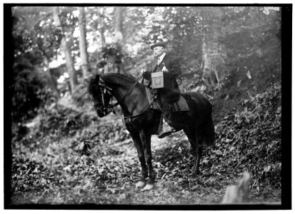 Man on horse in woods LOC hec.04120