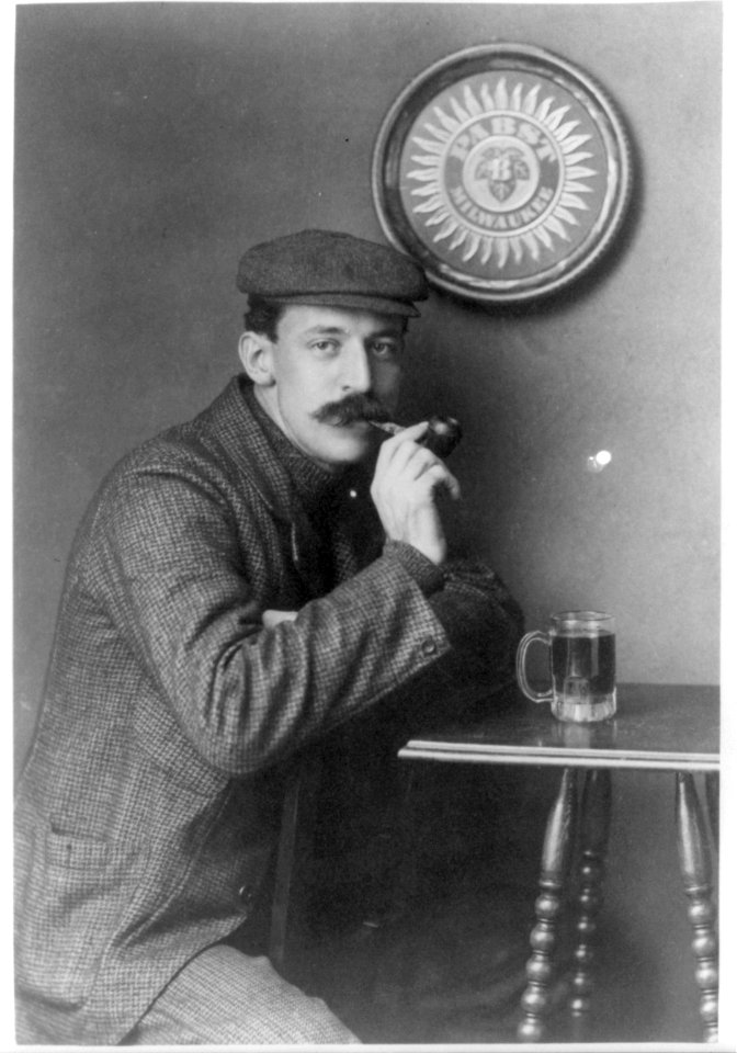 Man at table with pipe and mug under Pabst - Milwaukee sign - C.C. Jones LCCN2001703946