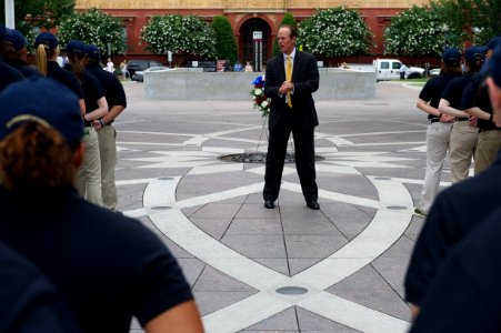 Man speaking to law enforcement explorers at the National Law Enforcement Officers Memorial