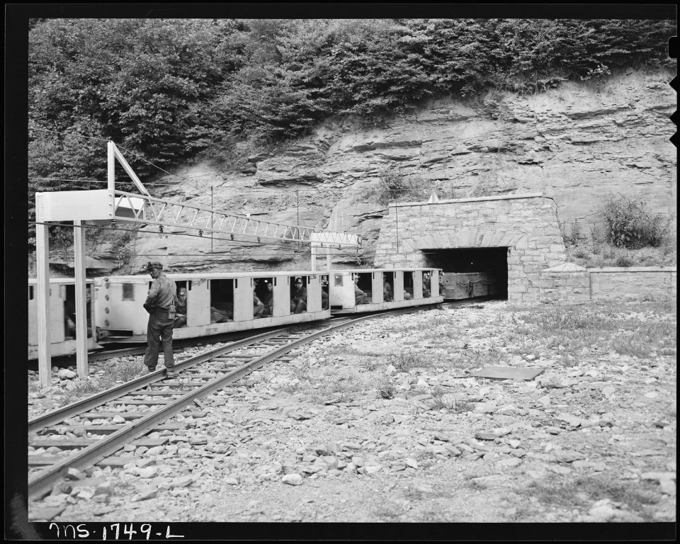 Man trip of the afternoon shift going into the mine, The cars forming the man trip cost $5000.00 a piece. Koppers... - NARA - 540912