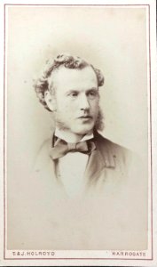 Man with curly hair by T & J Holroyd (1a)