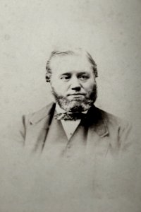 Man with trimmed beard by T & J Holroyd