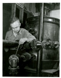 Man working with precipitator in pilot plant