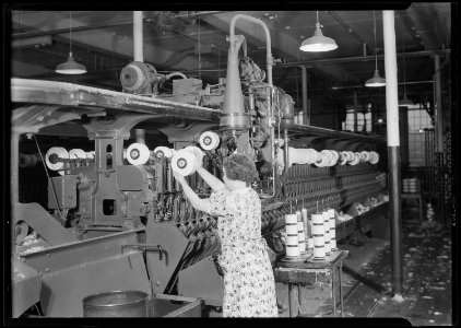 Manchester, New Hampshire - Textiles. Pacific Mills. Barber-Colman Automatic Spooler. (rear view) showing side of... - NARA - 518750