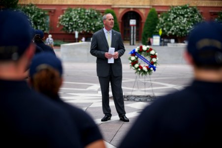 Man speaks to law enforcement explorers at National Law Enforcement Officers Memorial 2 photo