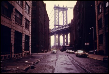 Manhattan Bridge Tower in Brooklyn, New York City, Framed through Nearby Buildings...06-1974 (3888292414)