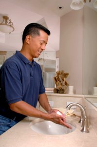 Man washing hands (1) photo