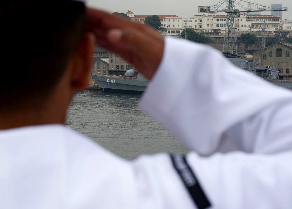 Manning the rails as USS America departs Rio De Janeiro 140809-N-MZ309-062