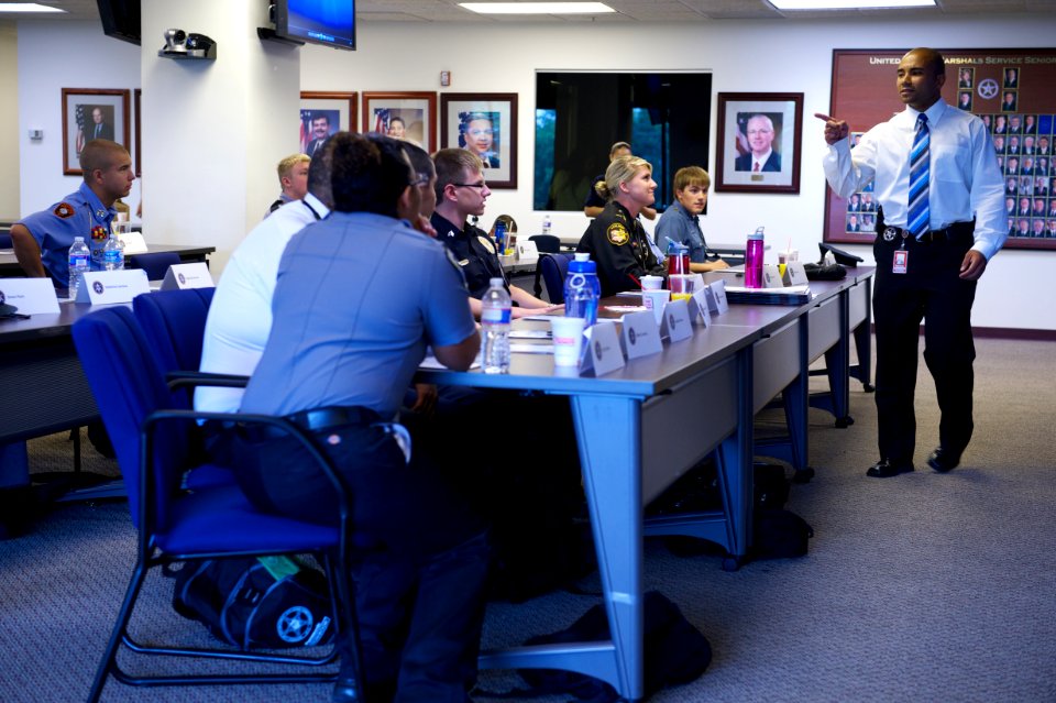 Man speaks to law enforcement explorers