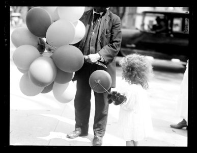 Man with baloons and child LCCN2016891354