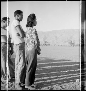 Manzanar Relocation Center, Manzanar, California. Evacuees watching a ball game late in the afterno . . . - NARA - 537988