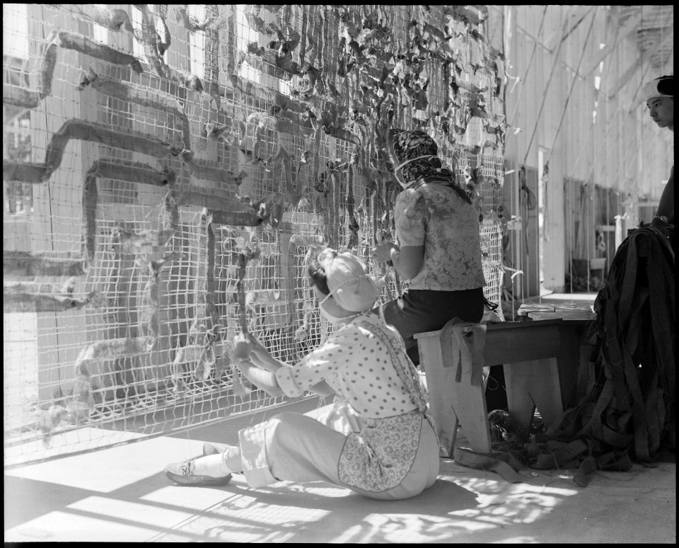 Manzanar Relocation Center, Manzanar, California. Making camouflage nets for the War Department. T . . . - NARA - 538104