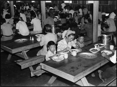 Manzanar Relocation Center, Manzanar, California. Mealtime in one of the messhalls at this War Relo . . . - NARA - 538170