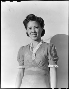 Manzanar Relocation Center, Manzanar, California. Mrs. Togo Tanaka, American-born young mother of J . . . - NARA - 538001