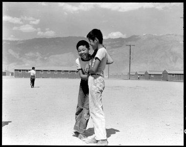 Manzanar Relocation Center, Manzanar, California. Young evacuees of Japanese ancestry at this War R . . . - NARA - 538011 photo