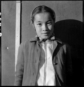 Manzanar Relocation Center, Manzanar, California. A young evacuee of Japanese ancestry at this War . . . - NARA - 538014