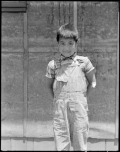Manzanar Relocation Center, Manzanar, California. An evacuee orphan, one of 65 now housed in the Ch . . . - NARA - 538188