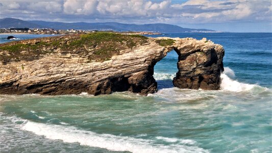 Costa waves stone bridge photo