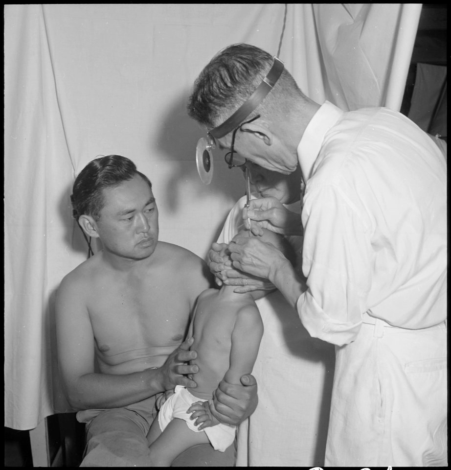 Manzanar Relocation Center, Manzanar, California. Doctor Takahashi, Eye, Ear, Nose and Throat Speci . . . - NARA - 538147