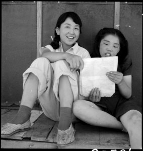 Manzanar Relocation Center, Manzanar, California. Evacuee girls practicing the songs they learned i . . . - NARA - 538089