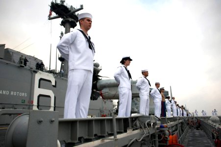 Manning the rails as USS America departs Rio De Janeiro 140809-N-FR671-077