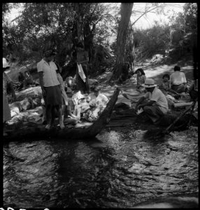 Manzanar Relocation Center, Manzanar, California. Family groups enjoying the mountain creek which f . . . - NARA - 538078