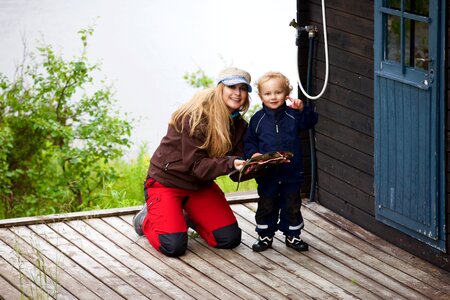 Child fishing mother and son