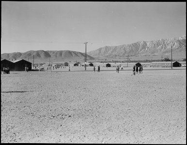 Manzanar Relocation Center, Manzanar, California. Looking southwest across the wide fire-break at t . . . - NARA - 538124