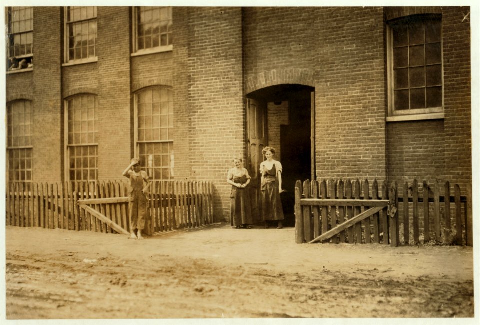 Manuel Oliver, George St., is small boy to left of dry works in carding room. Seems surely only 12 years old. LOC nclc.02254