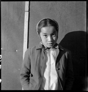 Manzanar Relocation Center, Manzanar, California. A young evacuee of Japanese ancestry at this War . . . - NARA - 538013