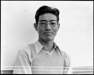 Manzanar Relocation Center, Manzanar, California. Henry Ishizuka, graduate of University of Califor . . . - NARA - 537995 photo