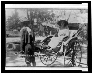 Marguerite Thompson Zorach sitting in a rickshaw LCCN2007680355