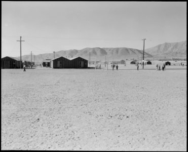 Manzanar Relocation Center, Manzanar, California. Looking southwest across the wide fire-break at t . . . - NARA - 538125